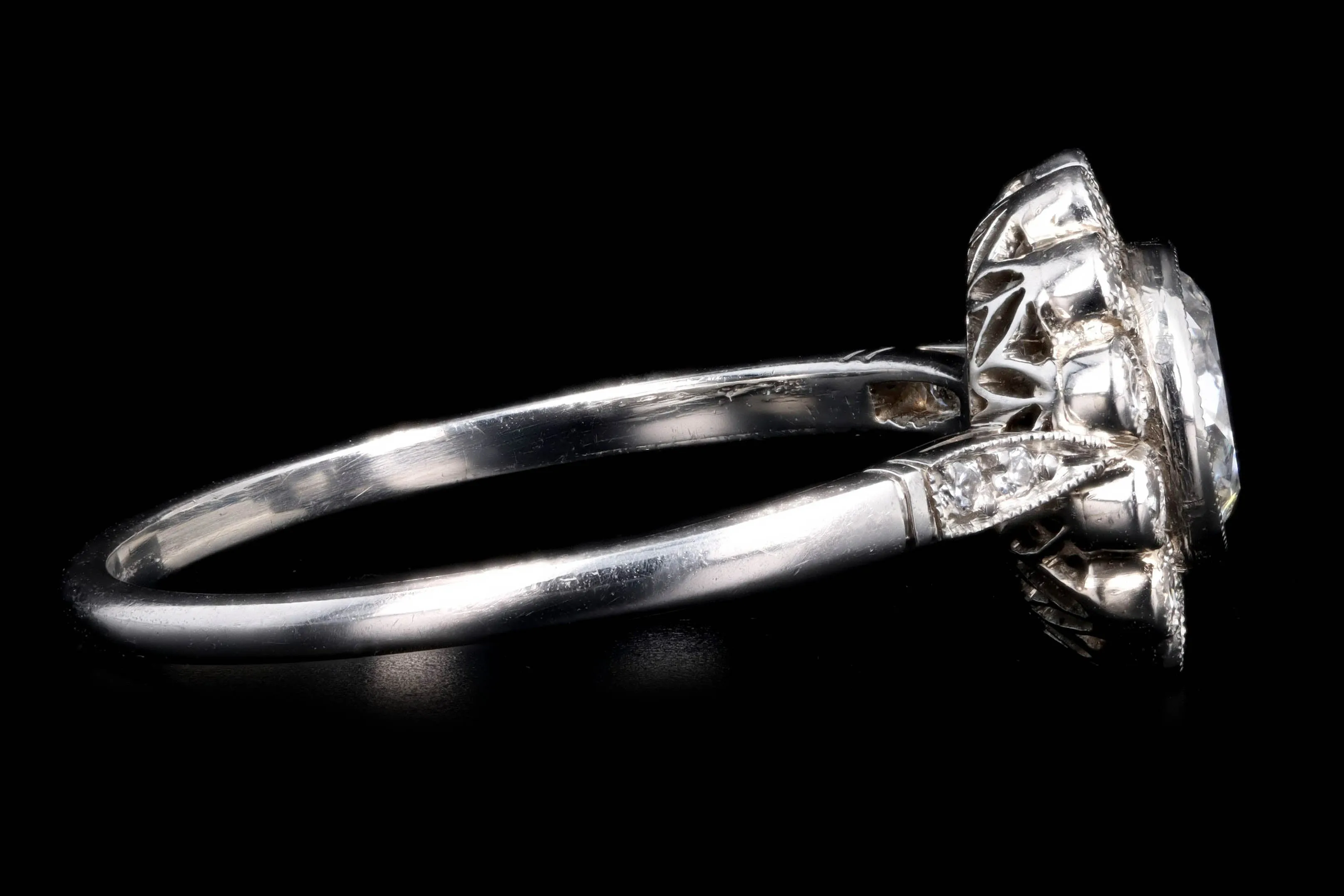 Art Deco Inspired Platinum 0.74 Carat Old European Cut Diamond Cluster Halo Engagement Ring