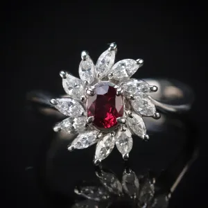 Estate Ruby & diamond cluster ring in platinum