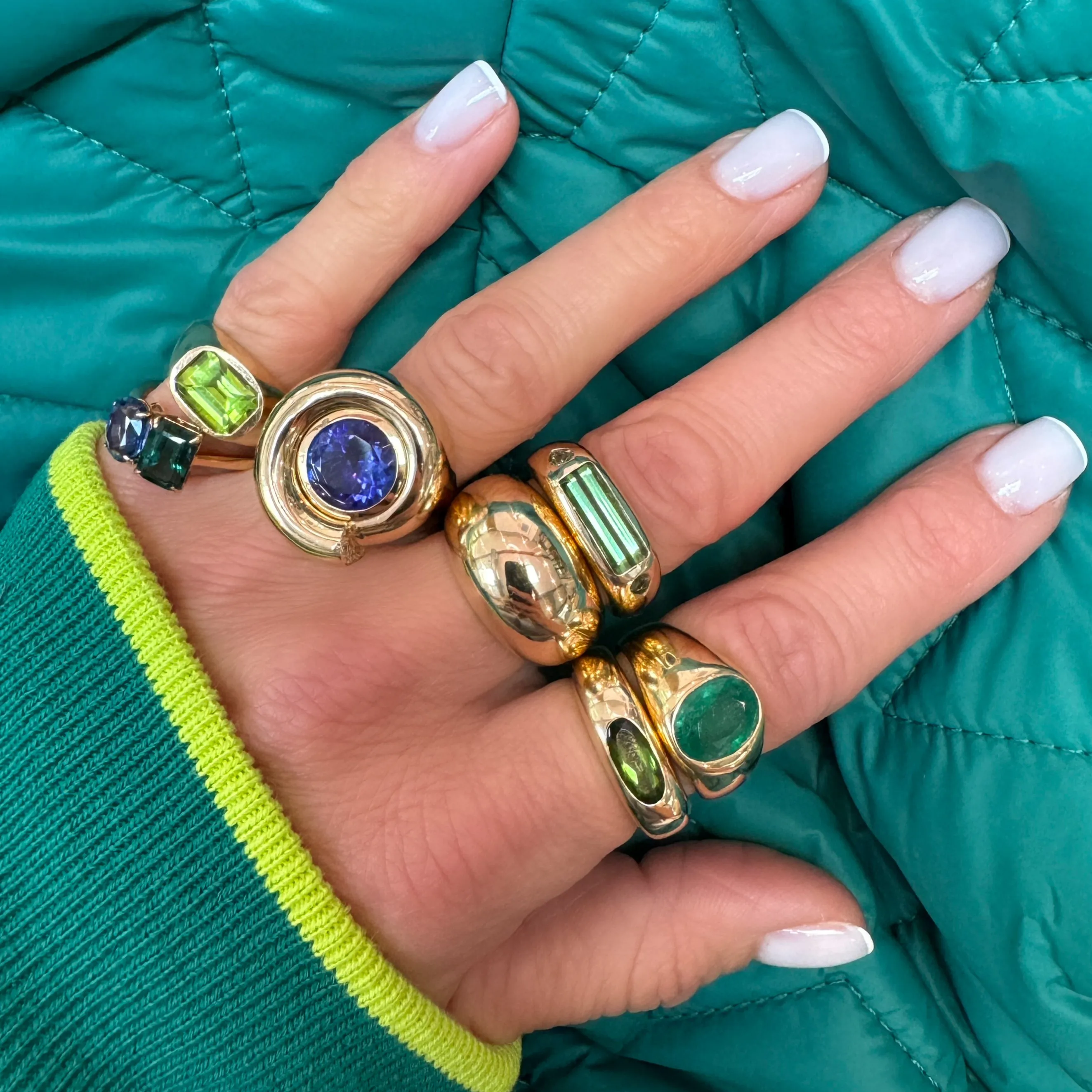 Glowing Bezel Set Emerald Dome Ring