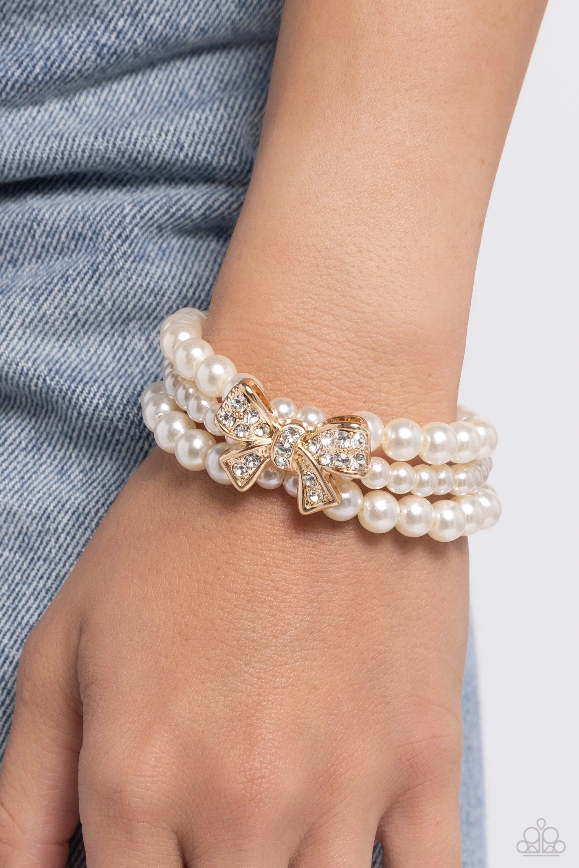 How Do You Do? - Gold - White Rhinestone Bow and Pearl Paparazzi Stretchy Bracelet