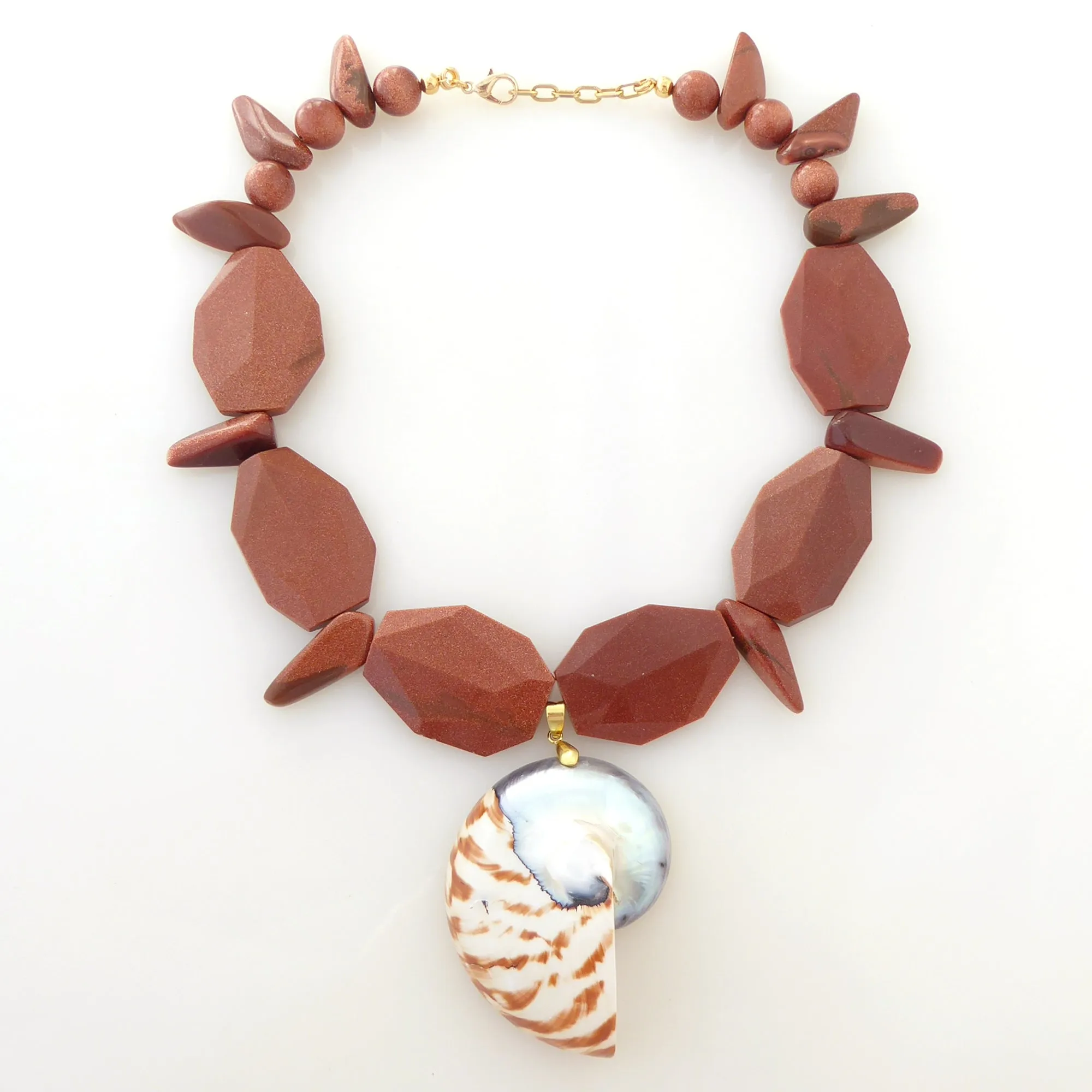 Nautilus shell and goldstone necklace
