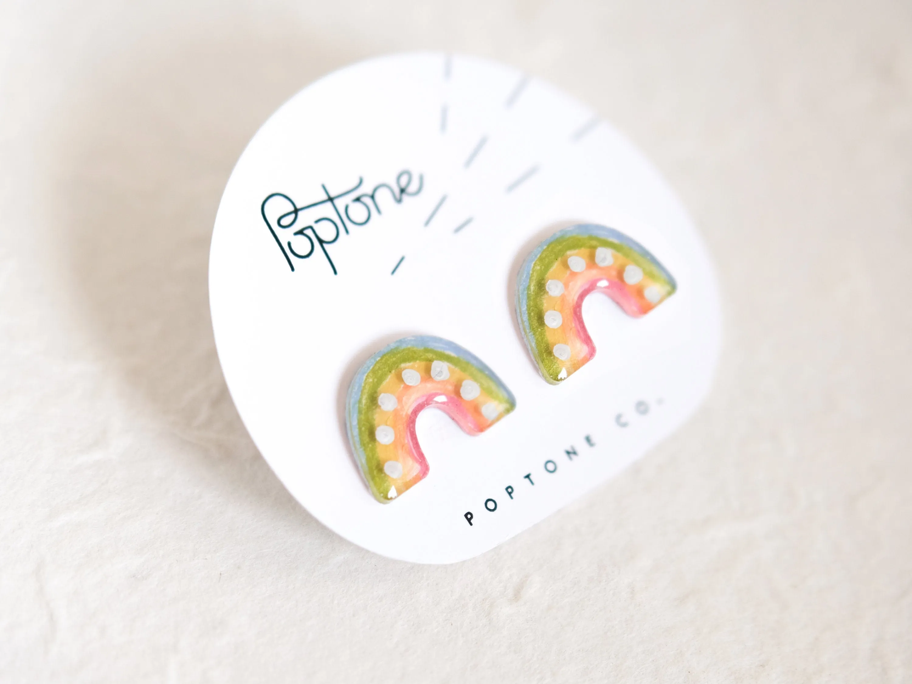 Simple Pastel Rainbow Arch Stud Earrings with metallic silver dots