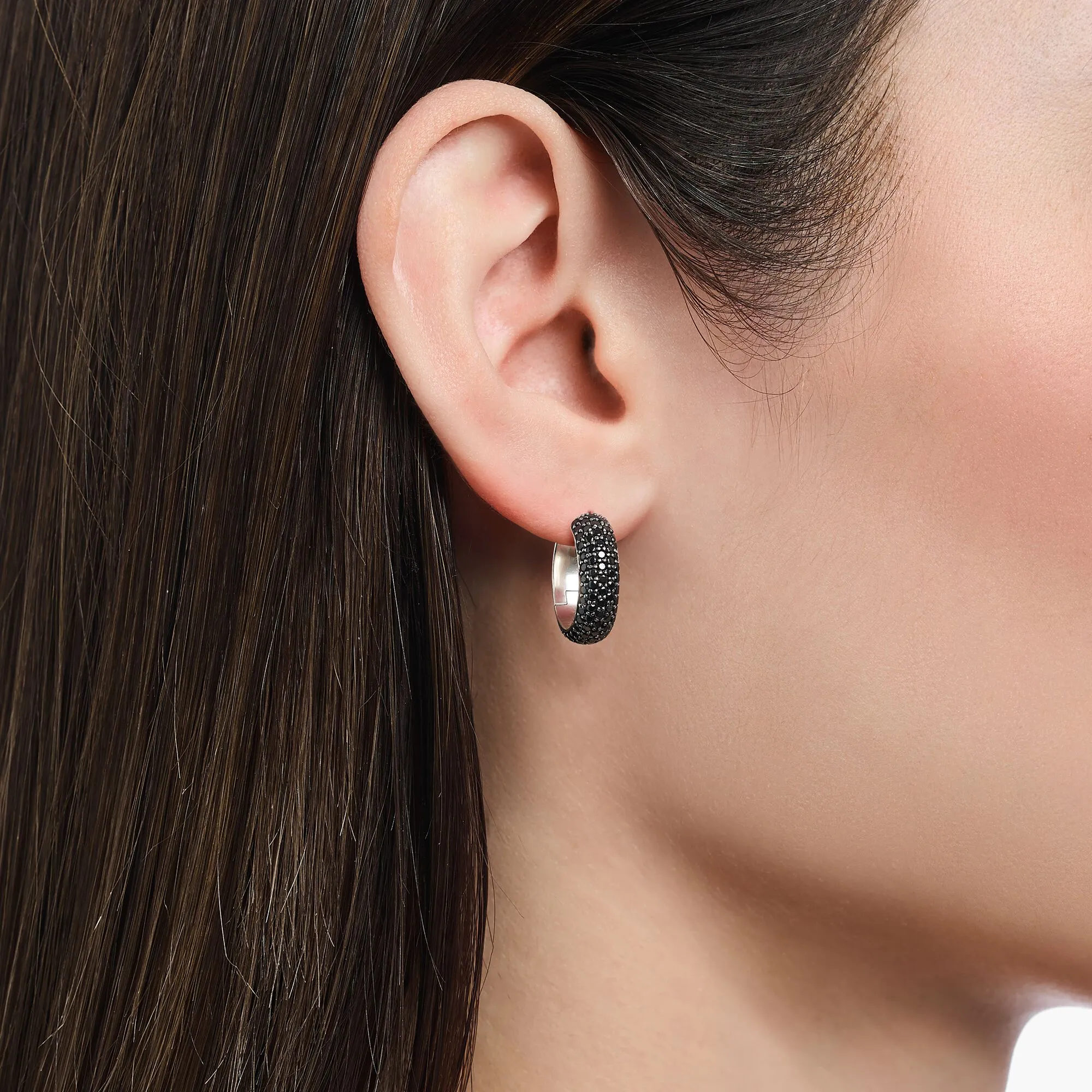 Small, wide hoop earrings with black zirconia