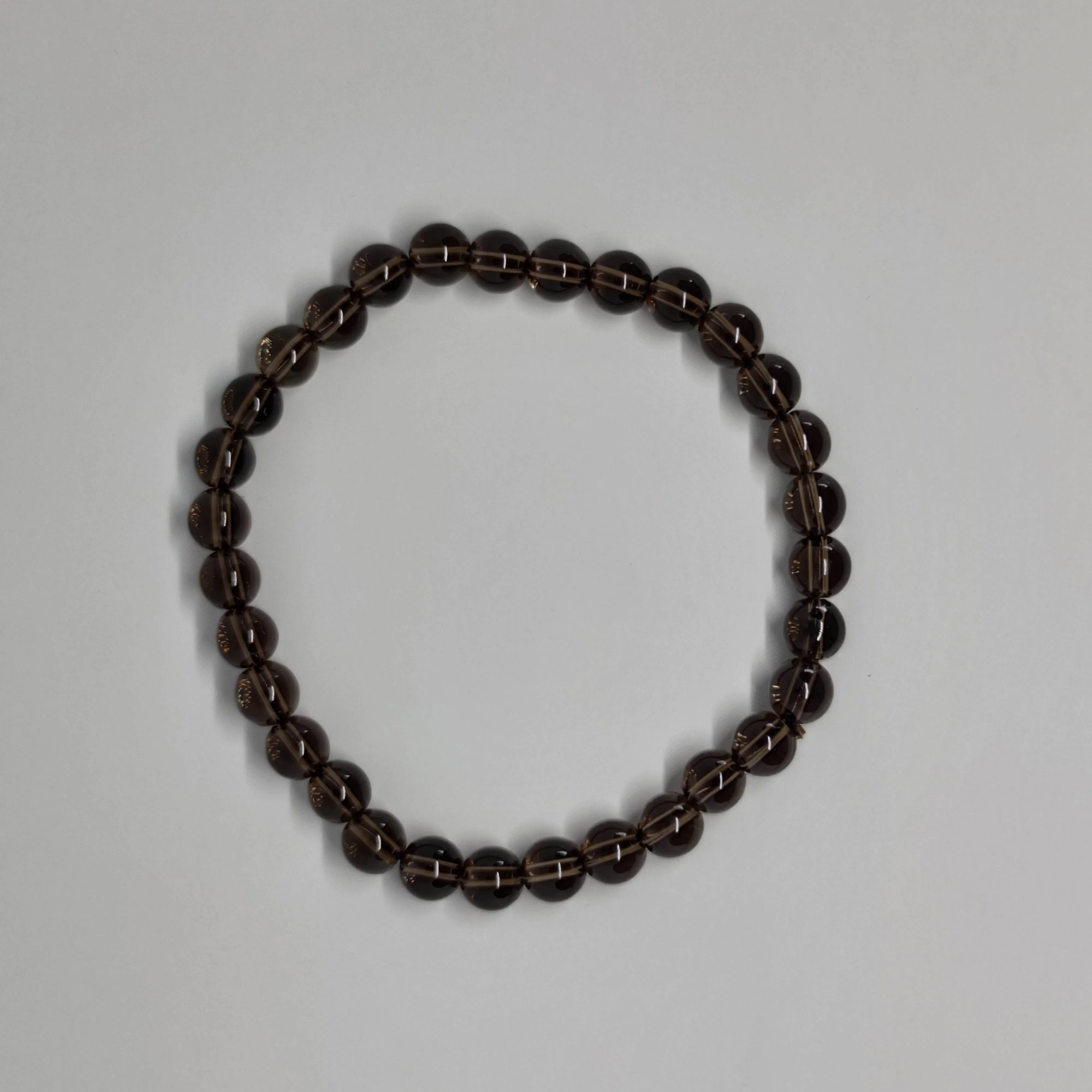 Smoky Quartz Round Bead Crystal Bracelet